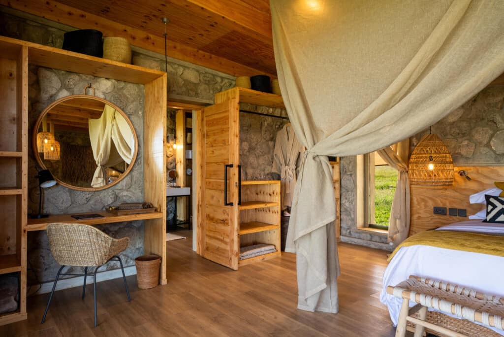 Asilia Africa Namiri Plains Retreats Guest vanity and Bathroom Entrance