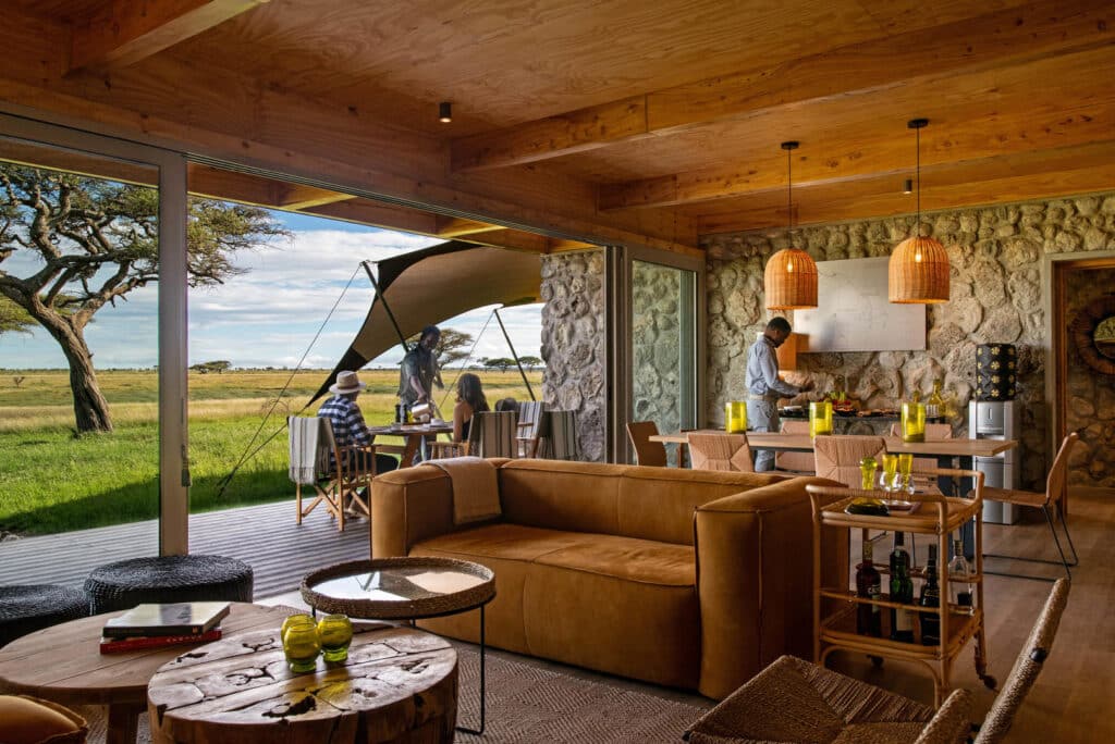 Asilia Africa Namiri Plains Retreats Guests dining on the deck