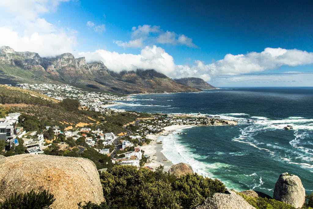 Breathtaking view of Cape Town's coastline with ocean, mountains, and beaches.