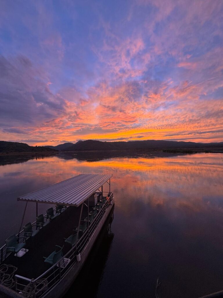 Pinks blues purple and orange skies of sunset over the Zambezi River from Zambezi Trader